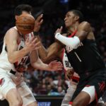 
              Portland Trail Blazers forward Drew Eubanks, left, and Houston Rockets forward Jabari Smith Jr., right, battle for the ball during the first quarter of an NBA basketball game in Portland, Ore., Friday, Oct. 28, 2022. (AP Photo/Steve Dipaola)
            