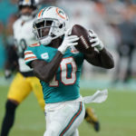 
              Miami Dolphins wide receiver Tyreek Hill (10) grabs a pass during the second half of an NFL football game against the Pittsburgh Steelers, Sunday, Oct. 23, 2022, in Miami Gardens, Fla. (AP Photo/Wilfredo Lee )
            