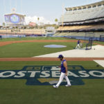
              Los Angeles Dodgers' Clayton Kershaw walks on the field during baseball practice Monday, Oct. 10, 2022, in Los Angeles for the National League division series against the San Diego Padres. (AP Photo/Mark J. Terrill)
            