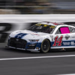
              Chase Briscoe (14) competes during a NASCAR Cup Series auto race at Charlotte Motor Speedway, Sunday, Oct. 9, 2022, in Concord, N.C. (AP Photo/Matt Kelley)
            