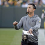 
              Green Bay Packers head coach Matt LaFleur directs his team during the first half of an NFL football game against the New England Patriots, Sunday, Oct. 2, 2022, in Green Bay, Wis. (AP Photo/Mike Roemer)
            
