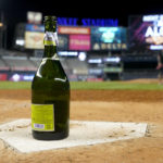 
              An empty bottle of champagne sits on home plate after the New York Yankees defeated the Cleveland Guardians in Game 5 of an American League Division baseball series, Tuesday, Oct. 18, 2022, in New York. (AP Photo/John Minchillo)
            