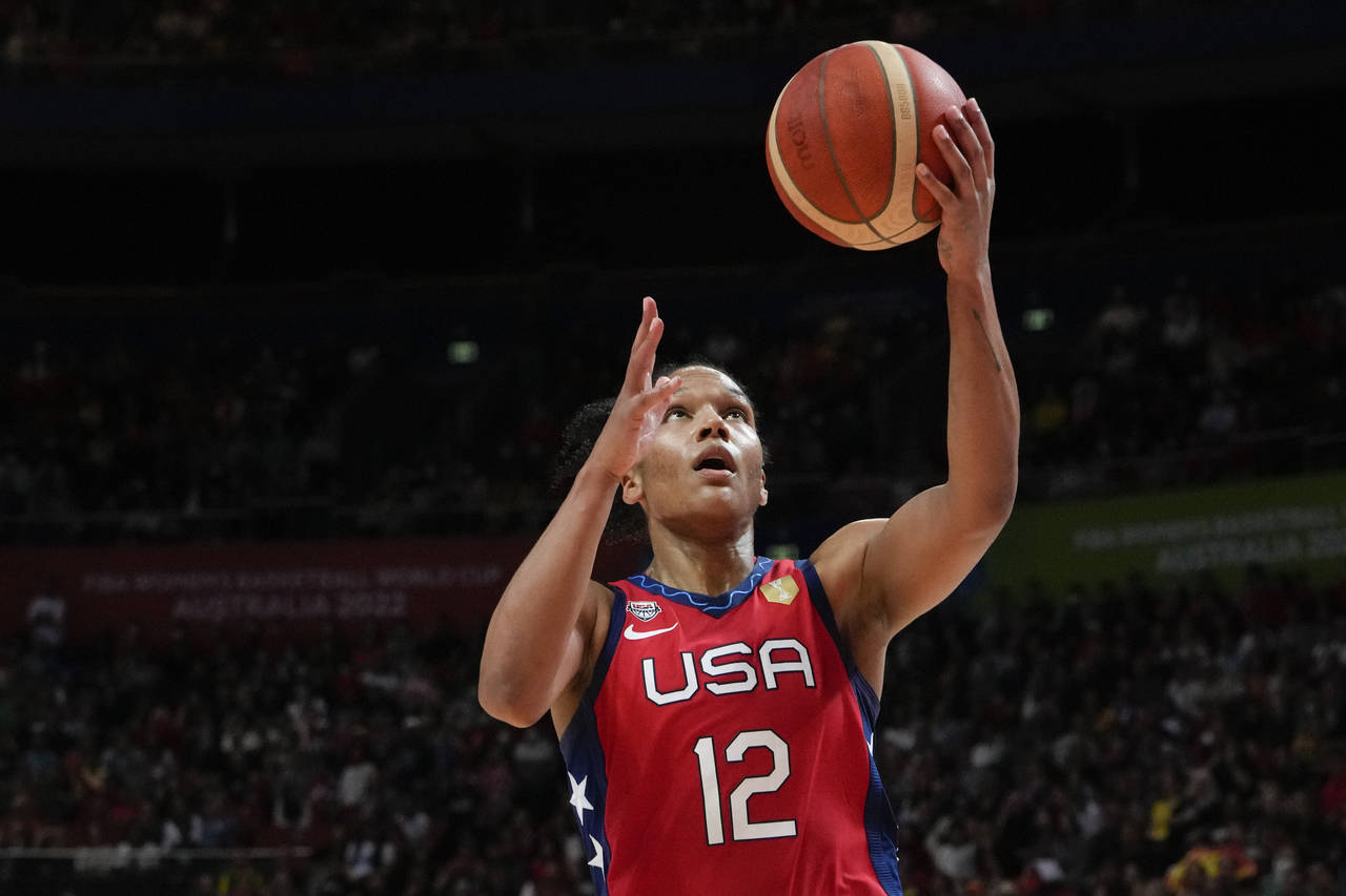 United States' Alyssa Thomas lays up to score a goal against China during their gold medal game at ...