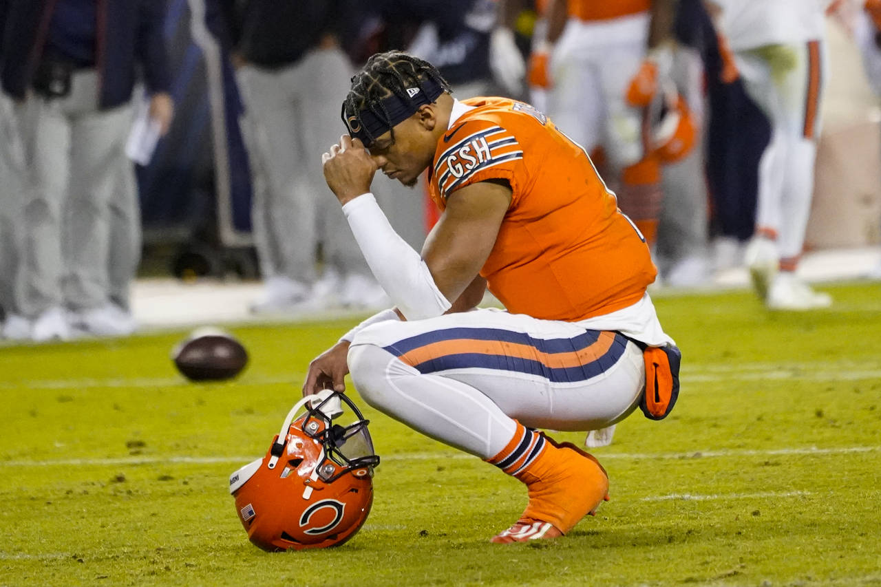 Chicago Bears quarterback Justin Fields after falling to score in the closing minute of the second ...