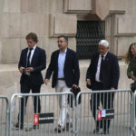 
              Josep Maria Bartomeu, former president of FC Barcelona, 2nd from left, arrives at a court in Barcelona, Spain, Monday Oct. 17, 2022. Former FC Barcelona player Neymar who now plays for Paris Saint-Germain returned to Spain Monday to face trial on fraud charges regarding his 2013 transfer from Santos to FC Barcelona. The Brazilian forward, his father, and the former executives of Barcelona and Santos are accused of hiding the true cost of his transfer with the alleged goal of cheating a private Brazilian company.(AP Photo/Joan Mateu Parra)
            