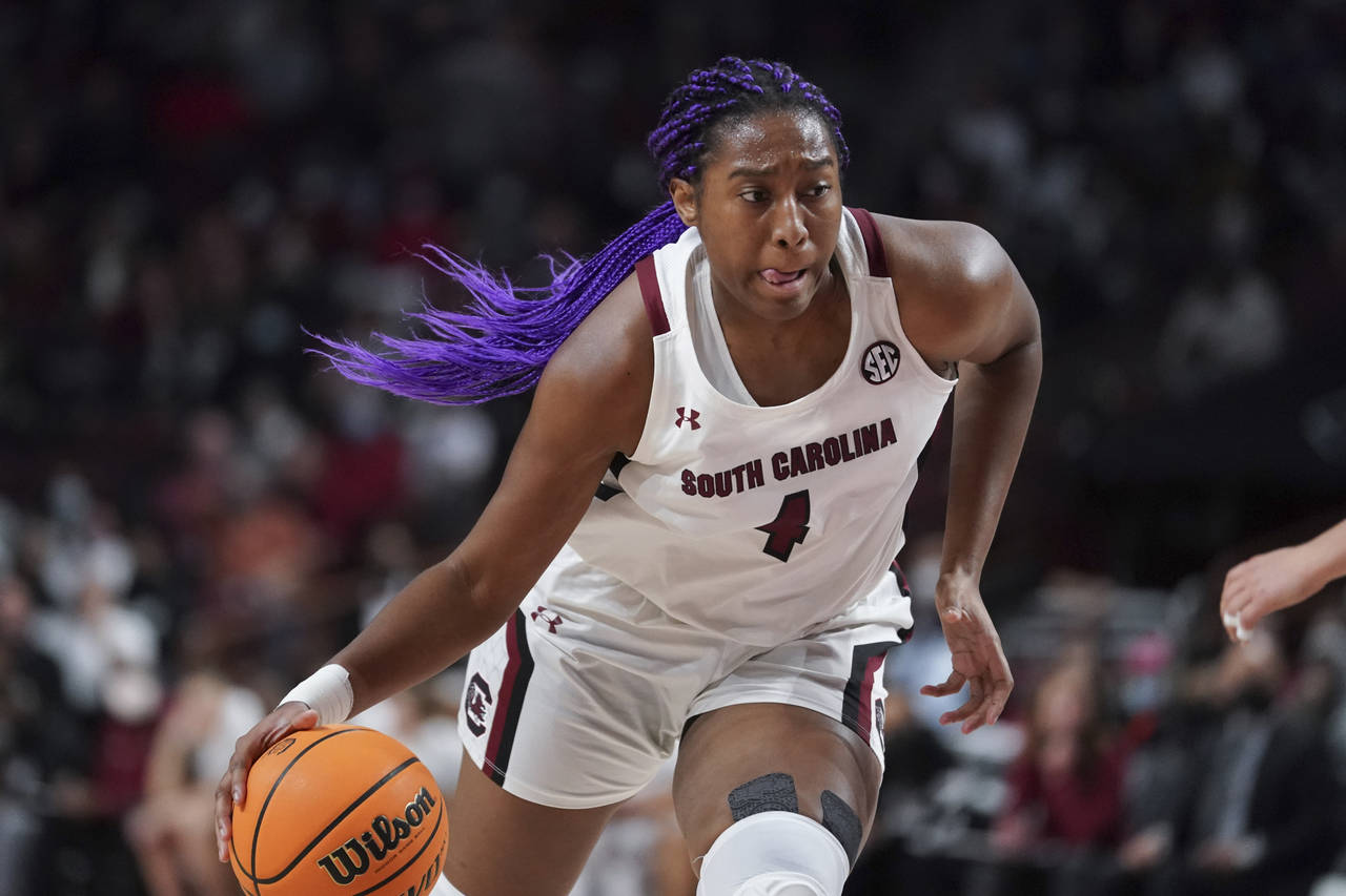 FILE - South Carolina forward Aliyah Boston dribbles the ball during the first half of the team's N...