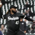 
              Chicago White Sox starting pitcher Johnny Cueto delivers during the first inning of a baseball game against the Minnesota Twins Monday, Oct. 3, 2022, in Chicago. (AP Photo/Charles Rex Arbogast)
            