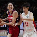 
              United States' Breanna Stewart runs at China's Jin Weina during their gold medal game at the women's Basketball World Cup in Sydney, Australia, Saturday, Oct. 1, 2022. (AP Photo/Mark Baker)
            