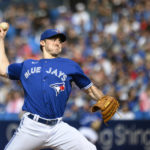 
              Toronto Blue Jays starting pitcher Ross Stripling throws during the first inning of a baseball game against the Boston Red Sox in Toronto on Saturday, Oct. 1, 2022. (Christopher Katsarov/The Canadian Press via AP)
            