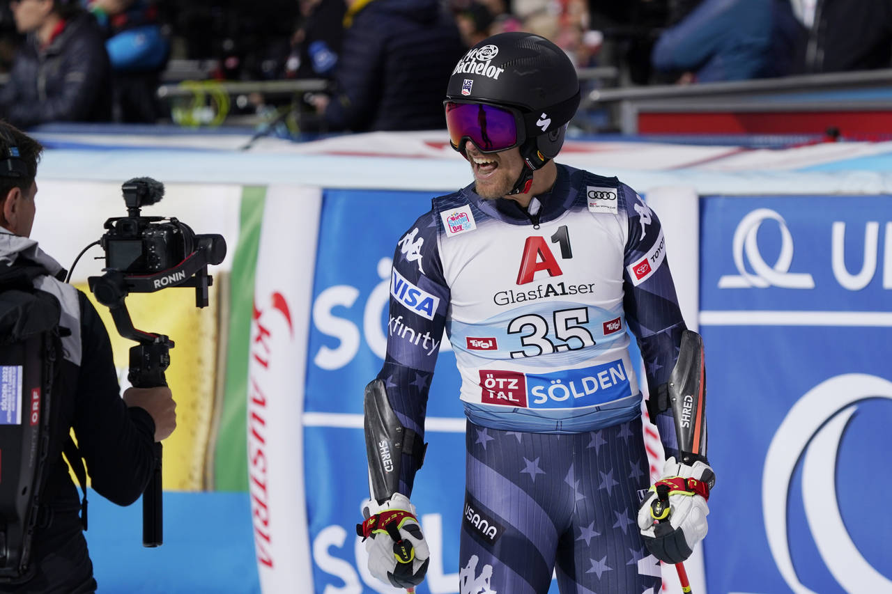 United States' Tommy Ford reacts after crossing the finish line to complete an alpine ski, men's Wo...