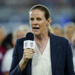 
              FILE - Cindy Parlow Cone, president of the U.S. Soccer Federation, speaks following a U.S. women's match against Nigeria at Audi Field, Tuesday, Sept. 6, 2022, in Washington. An independent investigation into the scandals that erupted in the National Women's Soccer League last season found emotional abuse and sexual misconduct were systemic in the sport, impacting multiple teams, coaches and players, according to a report released Monday, Oct. 3, 2022. Cindy Parlow Cone called the findings “heartbreaking and deeply troubling.” (AP Photo/Julio Cortez, File)
            