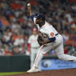 
              Houston Astros relief pitcher Hector Neris throws against the Philadelphia Phillies during the eighth inning of a baseball game Tuesday, Oct. 4, 2022, in Houston. (AP Photo/David J. Phillip)
            