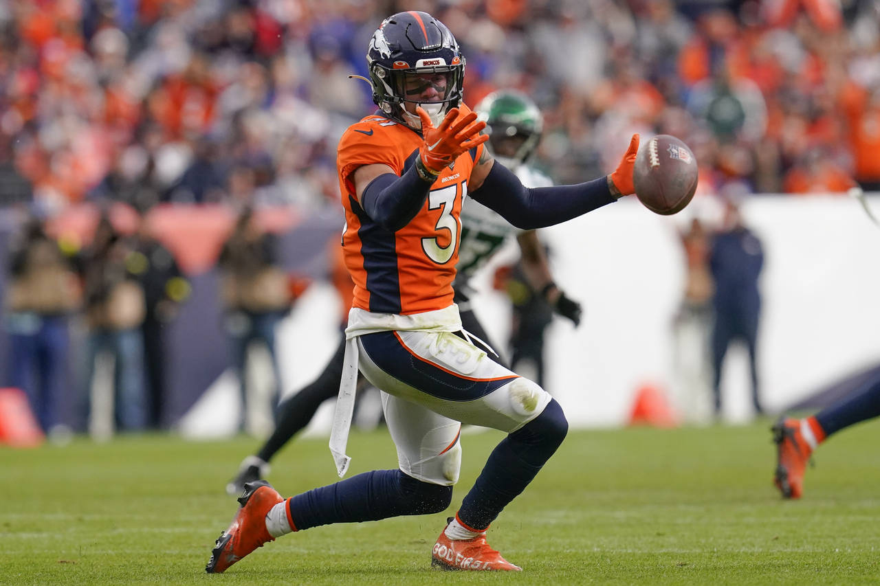 Denver Broncos safety Justin Simmons (31) misses an interception against the New York Jets during t...