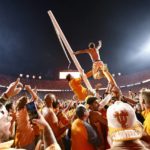 
              Tennessee fans tear down the goal post after defeating Alabama 52-49 in an NCAA college football game Saturday, Oct. 15, 2022, in Knoxville, Tenn. (AP Photo/Wade Payne)
            