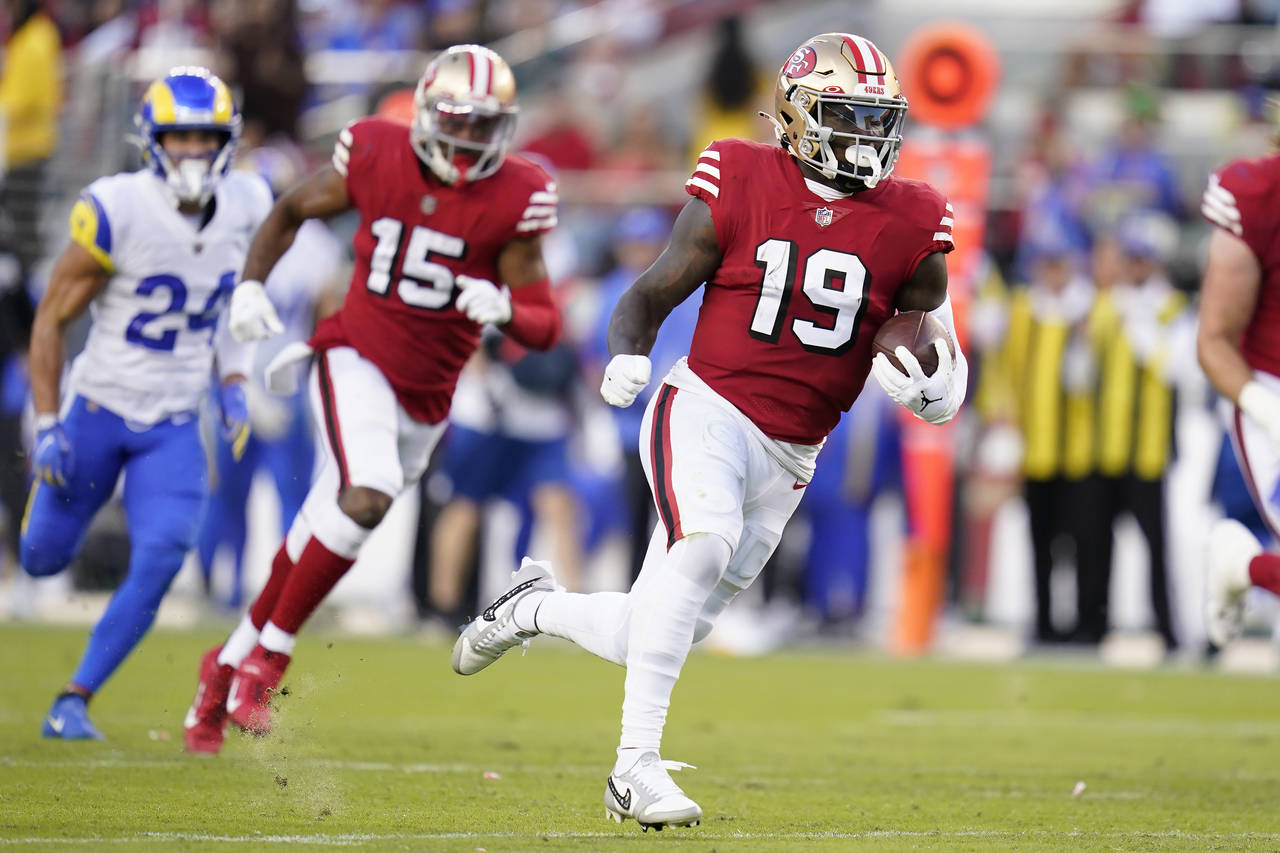 San Francisco 49ers wide receiver Deebo Samuel (19) runs toward the end zone to score against the L...