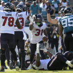 
              Houston Texans running back Dameon Pierce (31) celebrate his one-yard touchdown against the Jacksonville Jaguars during the second half of an NFL football game in Jacksonville, Fla., Sunday, Oct. 9, 2022. (AP Photo/Phelan M. Ebenhack)
            