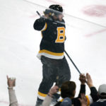 
              Boston Bruins left wing Brad Marchand celebrates after his goal during the second period of an NHL hockey game against the Detroit Red Wings, Thursday, Oct. 27, 2022, in Boston. Marchand, who underwent offseason double-hip surgery that was supposed to keep him out until the end of November, started the game. (AP Photo/Charles Krupa)
            