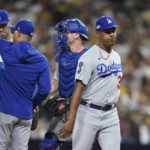 
              Los Angeles Dodgers relief pitcher Yency Almonte, right, exits during the seventh inning in Game 4 of a baseball NL Division Seriesm against the San Diego Padres, Saturday, Oct. 15, 2022, in San Diego. (AP Photo/Jae C. Hong)
            
