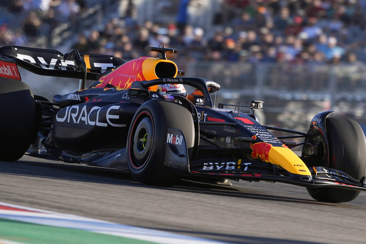 Red Bull driver Max Verstappen, of the Netherlands, heads through a turn during the second practice...
