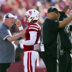 
              Nebraska offensive coordinator and quarterbacks coach Mark Whipple, left, chats with quarterback Casey Thompson after he threw an interception against Illinois during the first half of an NCAA college football game Saturday, Oct. 29, 2022, in Lincoln, Neb. (AP Photo/Rebecca S. Gratz)
            