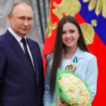 
              FILE - Russian President Vladimir Putin, left, poses for a photo with Kamila Valieva, a figure skater of the Russian Olympic Committee, in Moscow, Russia, Tuesday, April 26, 2022. The Russian Anti-Doping Agency will treat the Kamila Valieva doping case which shook figure skating at the Winter Olympics as confidential and won’t publish a verdict, it was announced Friday, Oct. 21, 2022 Valieva won Olympic gold in the team competition before finding out she tested positive for a banned substance before the Beijing Games. (Mikhail Klimentyev, Sputnik, Kremlin Pool Photo via AP, FILE)
            