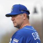 
              FILE - Kansas City Royals pitching coach Cal Eldred watches players warm up during a baseball spring training workout, Feb. 15, 2018, in Surprise, Ariz. Eldred and team manager Mike Matheny were fired by the Royals on Wednesday, Oct. 5, 2022, night shortly after the struggling franchise finished the season 65-97 with a listless 9-2 loss to the Cleveland Guardians. (AP Photo/Charlie Neibergall, File)
            