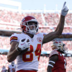 
              Kansas City Chiefs wide receiver Justin Watson (84) celebrates after catching a touchdown pass during the second half of an NFL football game against the San Francisco 49ers in Santa Clara, Calif., Sunday, Oct. 23, 2022. (AP Photo/Jed Jacobsohn)
            