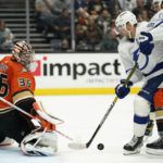 
              Anaheim Ducks goaltender John Gibson (36) stops a shot from Tampa Bay Lightning center Steven Stamkos (91) during the second period of an NHL hockey game in Anaheim, Calif., Wednesday, Oct. 26, 2022. (AP Photo/Ashley Landis)
            