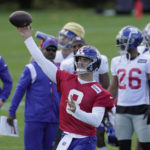
              New York Giants quarterback Daniel Jones, number 8, attends a practice session at Hanbury Manor in Ware, England, Friday, Oct. 7, 2022 ahead the NFL game against Green Bay Packers at the Tottenham Hotspur stadium on Sunday. (AP Photo/Kin Cheung)
            