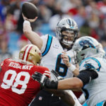 
              Carolina Panthers quarterback Baker Mayfield passes against the San Francisco 49ers during the first half an NFL football game on Sunday, Oct. 9, 2022, in Charlotte, N.C. (AP Photo/Rusty Jones)
            