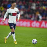 
              FILE - Portugal's Cristiano Ronaldo runs with the ball during the UEFA Nations League soccer match between the Czech Republic and Portugal at the Sinobo stadium in Prague, Czech Republic, Saturday, Sept. 24, 2022. (AP Photo/Petr David Josek, File)
            