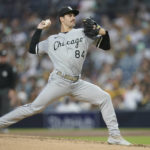 
              Chicago White Sox starting pitcher Dylan Cease works against a San Diego Padres batter during the third inning of a baseball game Saturday, Oct. 1, 2022, in San Diego. (AP Photo/Gregory Bull)
            