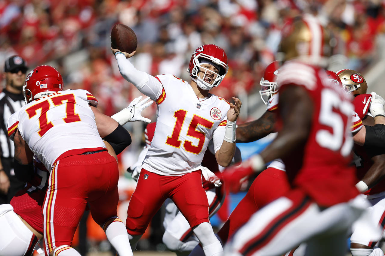 Kansas City Chiefs quarterback Patrick Mahomes (15) passes against the San Francisco 49ers during t...