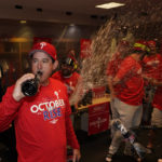 
              Philadelphia Phillies interim manager Rob Thomson celebrates after the Phillies won a baseball game against the Houston Astros to clinch a wild-card playoff spot, Monday, Oct. 3, 2022, in Houston. (AP Photo/David J. Phillip)
            