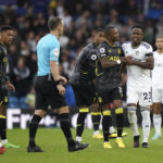 
              Leeds United's Luis Sinisterra reacts after being shown a second yellow card during the English Premier League soccer match between Aston Villa and Leeds United, at Elland Road, Leeds, England, Sunday Oct. 2, 2022. (Tim Goode/PA via AP)
            