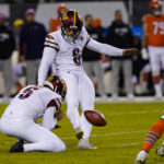 
              Washington Commanders kicker Joey Slye kicks a field goal from the hold of Tress Way in the first half of an NFL football game against the Chicago Bears in Chicago, Thursday, Oct. 13, 2022. (AP Photo/Charles Rex Arbogast)
            