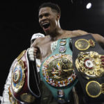 
              United States' Devin Haney displays his belts after defeating George Kambosos Jr. of Australia as Haney defends his undisputed lightweight boxing title in Melbourne, Sunday, Oct. 16, 2022. (AP Photo/Hamish Blair)
            