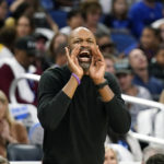 
              Orlando Magic head coach Jamahl Mosley shouts instructions to his players during the first half of an NBA basketball game against the Boston Celtics, Saturday, Oct. 22, 2022, in Orlando, Fla. (AP Photo/John Raoux)
            