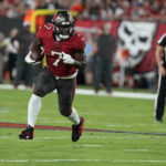 
              Tampa Bay Buccaneers running back Leonard Fournette runs for a first down during the first half of an NFL football game against the Baltimore Ravens Thursday, Oct. 27, 2022, in Tampa, Fla. (AP Photo/Chris O'Meara)
            