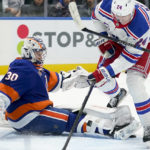 
              New York Islanders goaltender Ilya Sorokin (30) makes a save against New York Rangers right wing Kaapo Kakko (24) in the first period of an NHL hockey game, Wednesday, Oct. 26, 2022, in Elmont, N.Y. (AP Photo/John Minchillo)
            