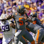 
              Tennessee quarterback Hendon Hooker (5) passes in the first half of an NCAA college football game against LSU in Baton Rouge, La., Saturday, Oct. 8, 2022. (AP Photo/Gerald Herbert)
            