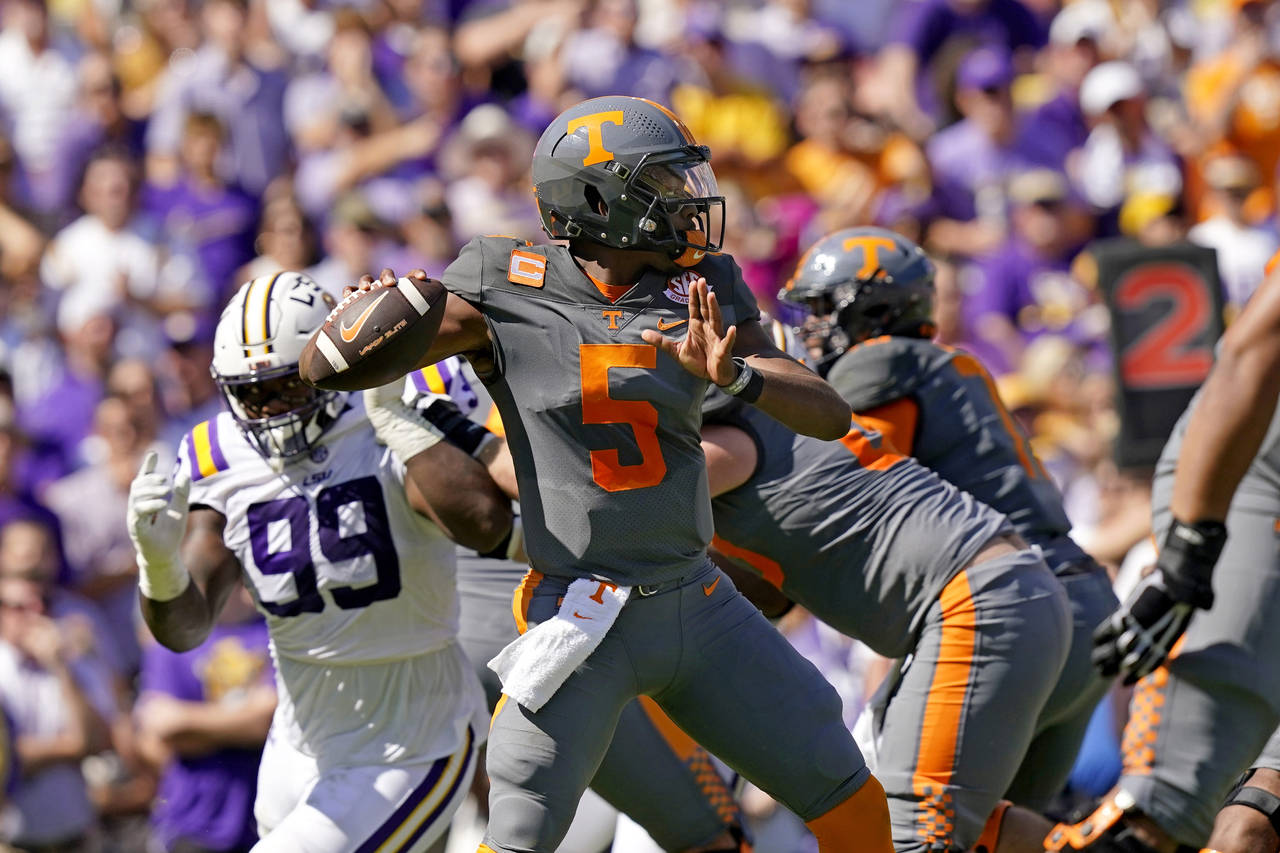 Tennessee quarterback Hendon Hooker (5) passes in the first half of an NCAA college football game a...