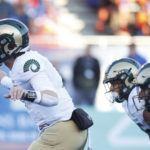 
              Colorado State quarterback Clay Millen, left, calls a play against Boise State during the first half of an NCAA college football game in Boise, Idaho, Saturday, Oct. 29, 2022. (AP Photo/Otto Kitsinger)
            