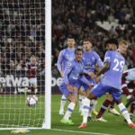 
              West Ham's Kurt Zouma, right, scores his sides first goal during the English Premier League soccer match between West Ham United and Bournemouth at the London Stadium in London, England, Monday, Oct. 24, 2022. (AP Photo/Ian Walton)
            