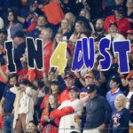 
              Fans cheer during the seventh inning in Game 2 of baseball's World Series between the Houston Astros and the Philadelphia Phillies on Saturday, Oct. 29, 2022, in Houston. (AP Photo/Sue Ogrocki)
            