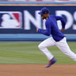
              Los Angeles Dodgers' Mookie Betts runs the bases during baseball practice Monday, Oct. 10, 2022, in Los Angeles for the National League division series against the San Diego Padres. (AP Photo/Mark J. Terrill)
            