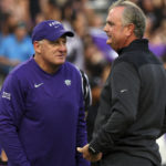 
              Kansas State head coach Chris Klieman, left, and TCU head coach Sonny Dykes, right, visit on the field before an NCAA college football game Saturday, Oct. 22, 2022, in Fort Worth, Texas. (AP Photo/Richard W. Rodriguez)
            