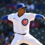 
              Chicago Cubs starter Marcus Stroman delivers a pitch during the first inning of a baseball game against the Cincinnati Reds, Sunday, Oct. 2, 2022, in Chicago. (AP Photo/Paul Beaty)
            