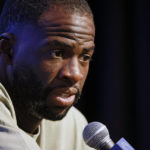 
              Golden State Warriors' Draymond Green speaks during an NBA basketball news conference Saturday, Oct. 8, 2022, at Chase Center in San Francisco, Calif.. Green made a statement and took questions from members of the news media after an incident where Green punched teammate Jordan Poole during practice. (Santiago Mejia/San Francisco Chronicle via AP)
            