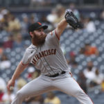 
              San Francisco Giants starting pitcher John Brebbia winds up against the San Diego Padres in the first inning of a baseball game, Wednesday, Oct. 5, 2022, in San Diego. (AP Photo/Derrick Tuskan)
            